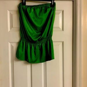 A strapless jade green top